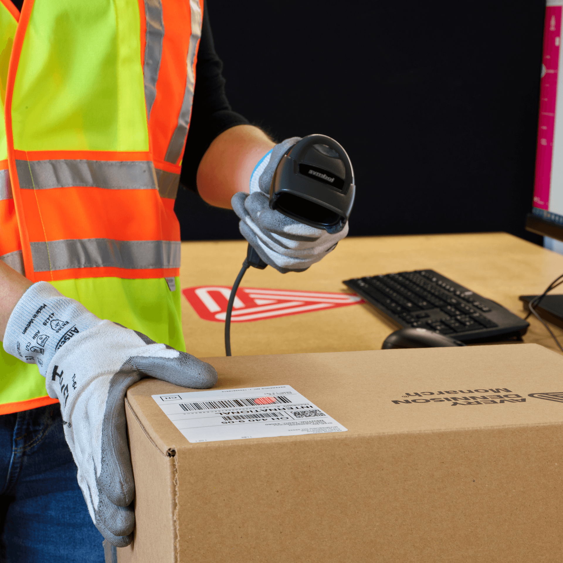 person using scanning equipment to locate products in a distribution center