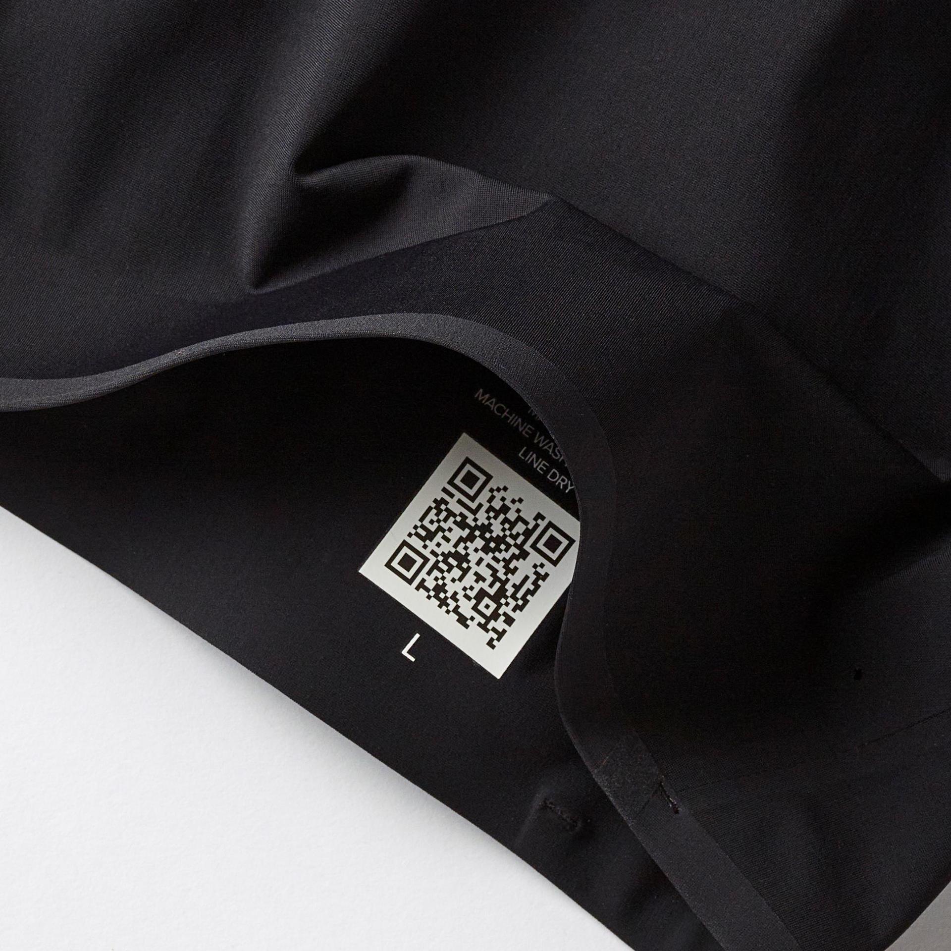 close up of interior QR heat transfer label in a sports bra