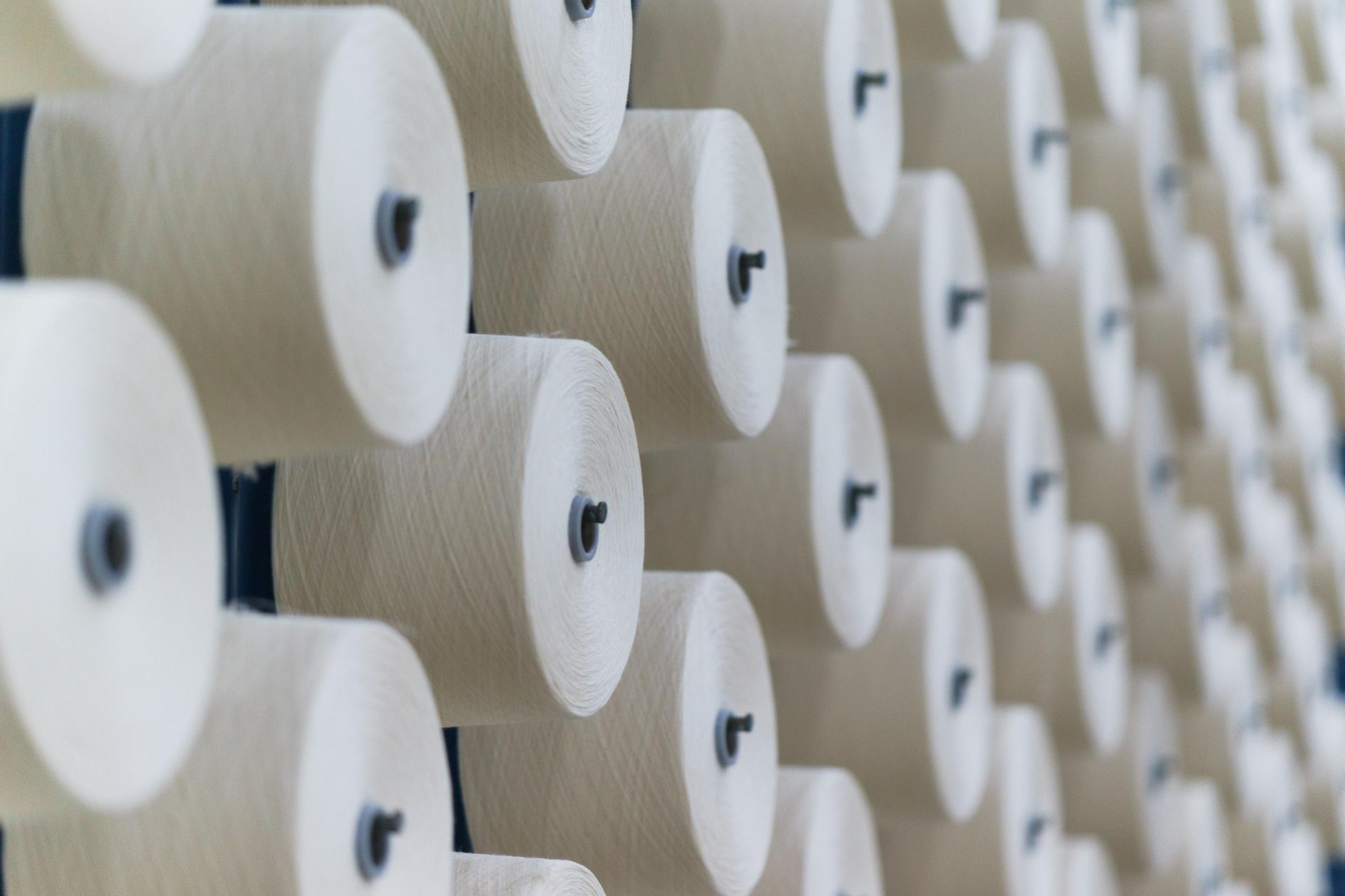 large group of thread cones in a textile mill