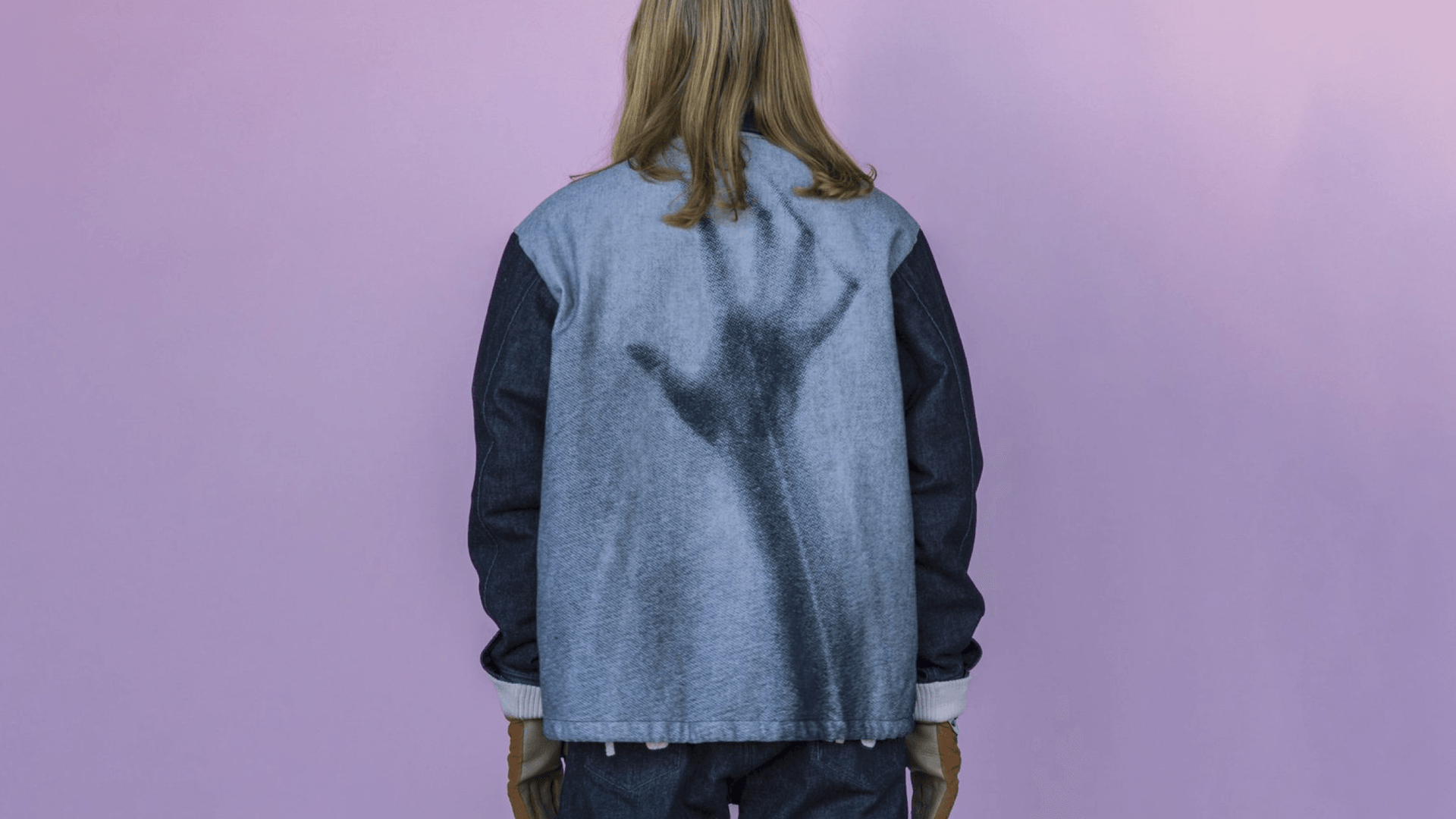 jacket featuring a large hand print across the back